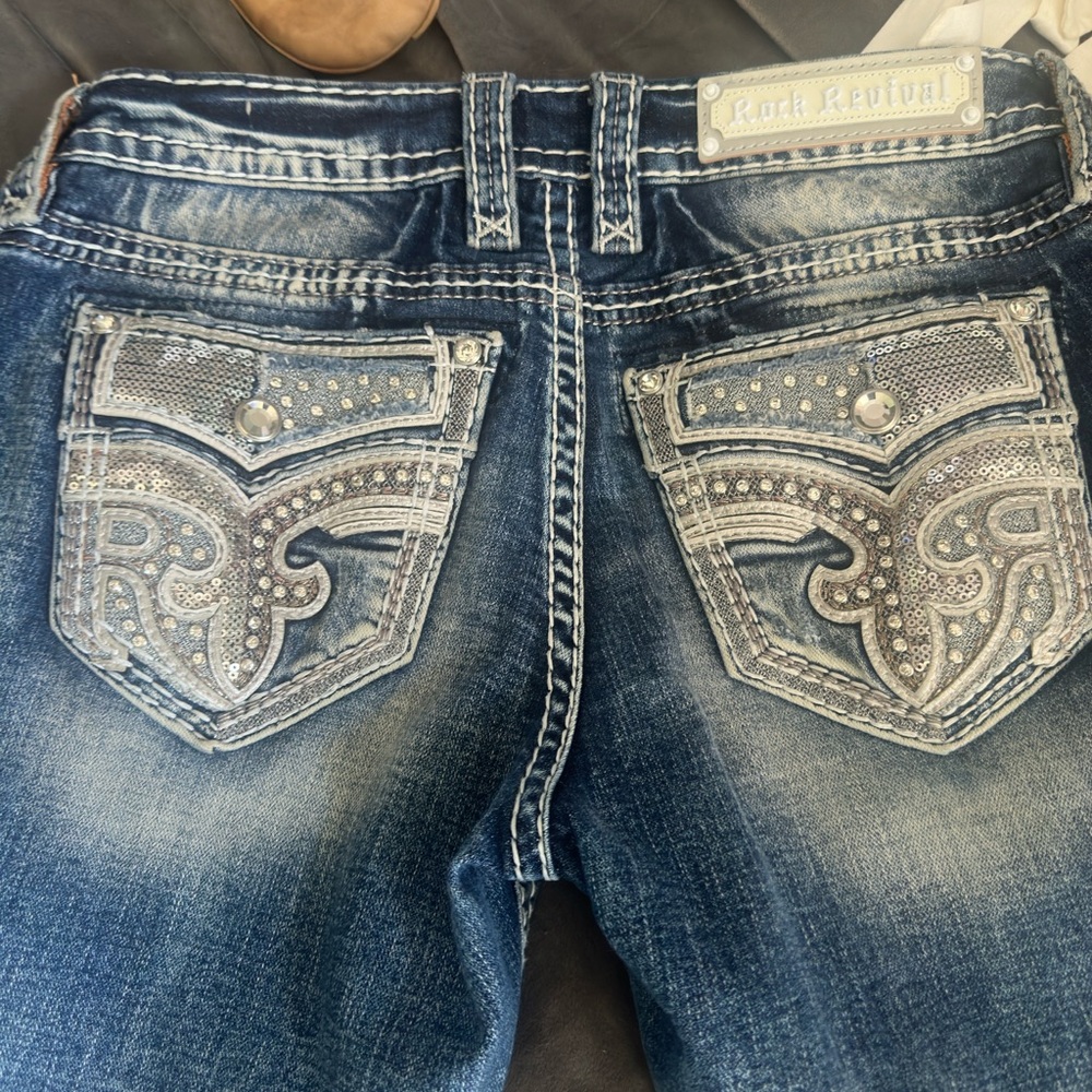 Rock Revival Amberlight boot cut Jean size 27. Like new condition. Lost weight